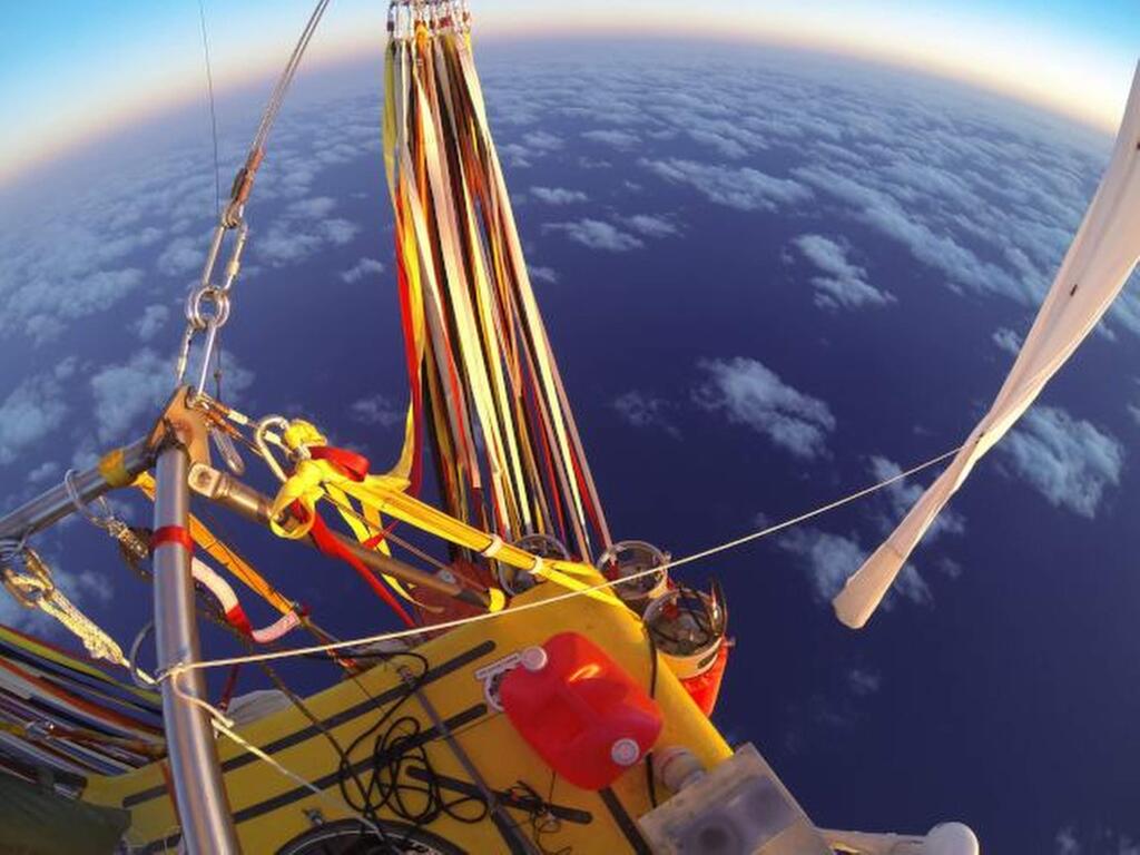 In Monday, Jan. 26, 2015 photo provided by the Two Eagles Balloon Team, Troy Bradley of New Mexico and Leonid Tiukhtyaev of Russia set off from Saga, Japan, shortly before 6:30 a.m. JST Sunday, Jan. 25, 2015, in their quest to pilot their helium-filled balloon from Japan in a bid to reach North America and break two major records en route. in their quest to pilot their helium-filled balloon from Japan to North America and break two major records en route. The attempt will put them on course to break a distance record of 5,208 miles (8,381 kilometers). They also want to break the flight-duration record of 137 hours set in 1978 when Ben Abruzzo, Maxie Anderson and Larry Newman made the first trans-Atlantic balloon flight. (AP Photo/Troy Bradley, Two Eagles Balloon Team)