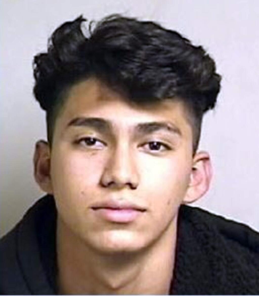 This undated booking photo released by the Contra Costa County District Attorney shows Bryan Sermeno-Chachagua, 18. He is one of two adults and two juveniles charged for their involvement in the fatal shooting of a 17-year-old student near his San Francisco Bay Area high school. The Contra Costa County district attorney on Tuesday, Nov. 7, 2017 charged Sermeno-Chachagua and Kristhiam Uceda, 20, with murder and connected charges for the slaying of 17-year-old Lawrence Janson. (Contra Costa County District Attorney via AP)