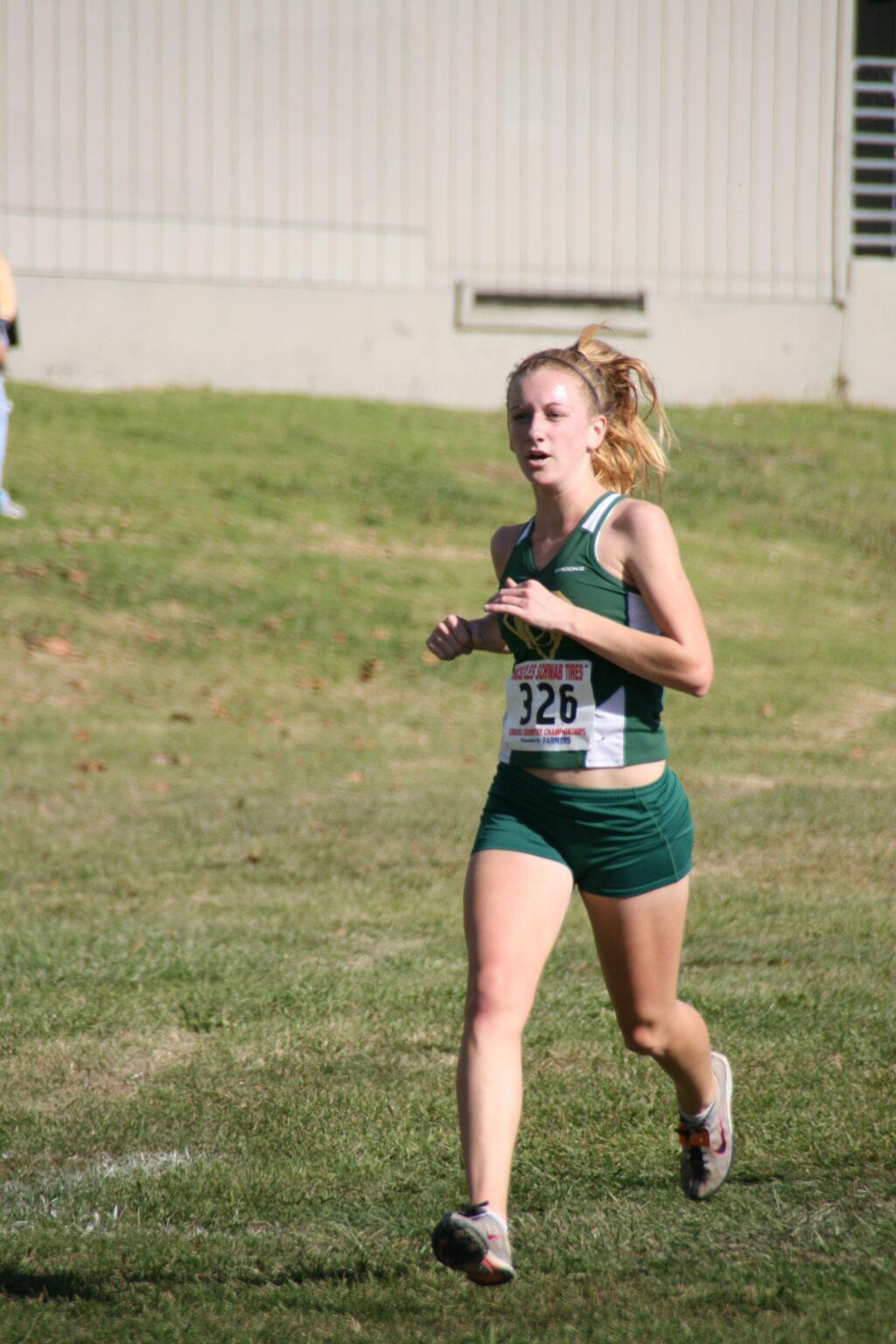 ARGUS-COURIER FILE PHOTOAshley Moffet wasa standout cross country and track runner at Casa Grande High School. Sunday she will compete in the 108th Dipsea Race.