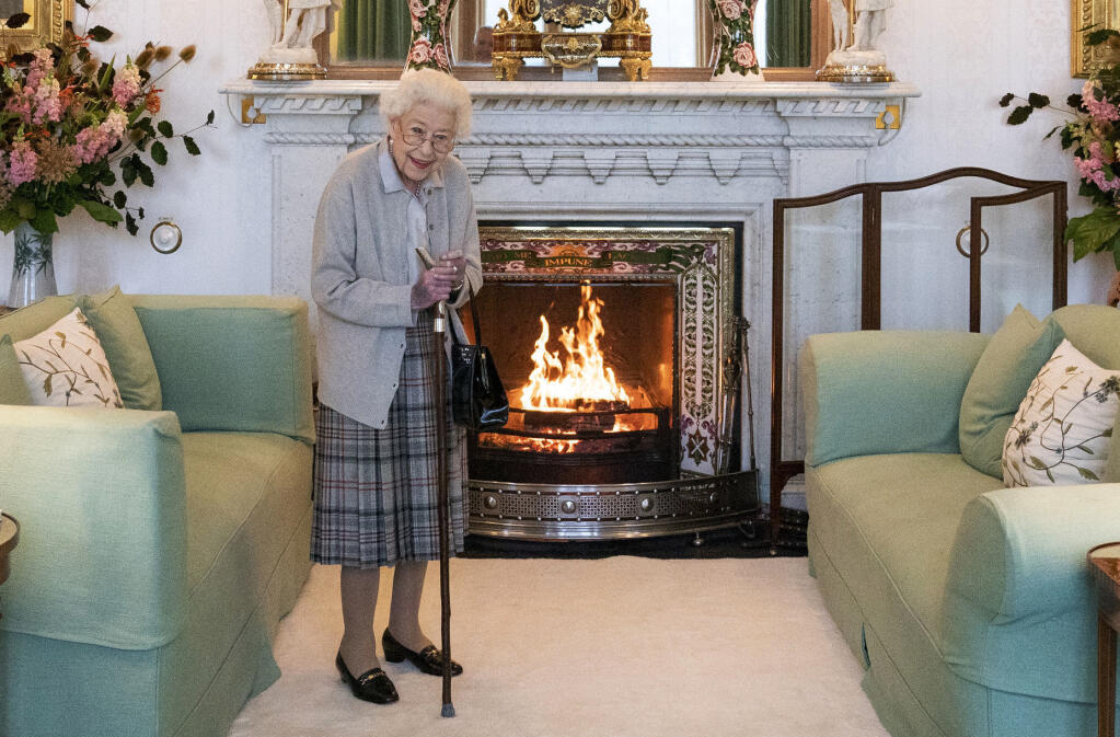 FILE - Britain's Queen Elizabeth II waits in the Drawing Room before receiving Liz Truss for an audience at Balmoral, in Scotland, Tuesday, Sept. 6, 2022, where Truss was invited to become Prime Minister and form a new government.  (Jane Barlow/Pool Photo via AP, File)