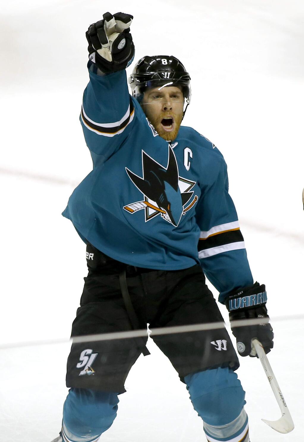 San Jose Sharks center Joe Pavelski celebrates after scoring a goal against the Nashville Predators during the third period of Game 2 in an NHL hockey Western Conference semifinal series Sunday, May 1, 2016, in San Jose, Calif. Sharks won 3-2. (AP Photo/Tony Avelar)