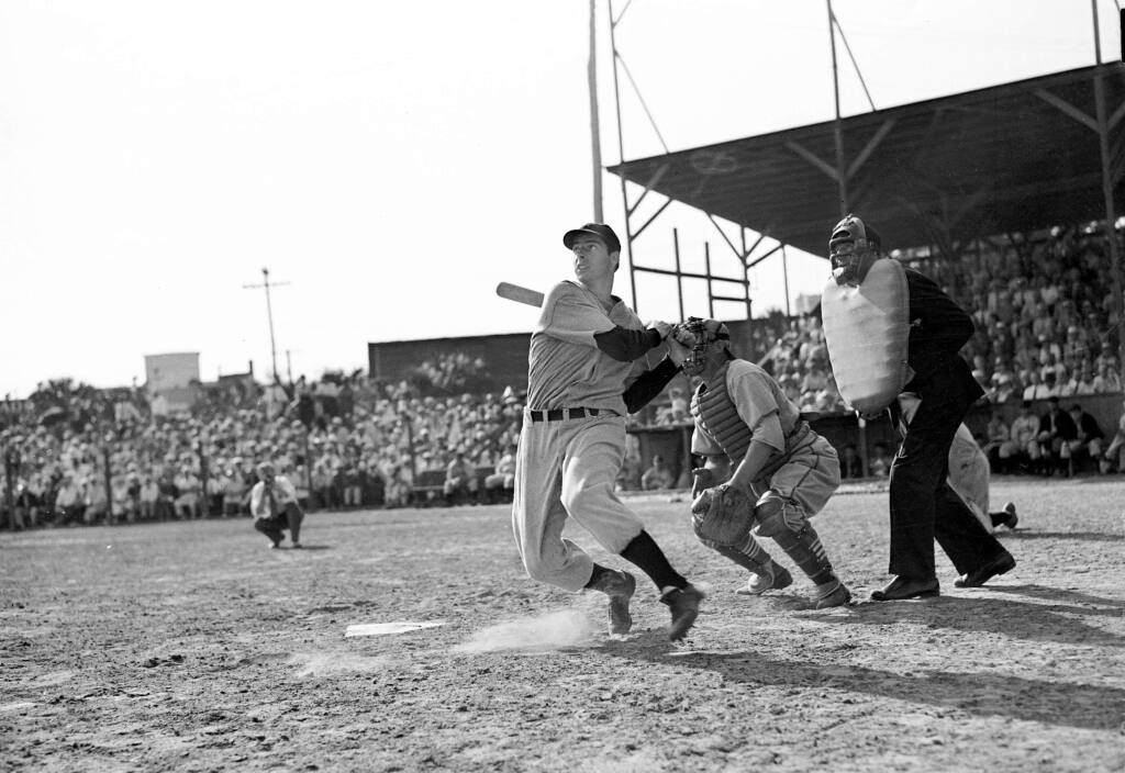 On Feb. 27, 1938, Joe DiMaggio came to the Santa Rosa Junior College field and gave a hitting exhibition before a game between the San Francisco Seals and the Pacific Greyhounds. The event was a benefit for Ursuline College, and attracted an overflow crowd of 3,000 fans. In this photo, DiMaggio appears in a 1939 exhibition in St. Petersburg, Florida. (AP Photo)