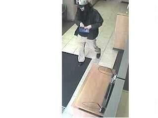 Surveillance camera captured this image of a man suspected of robbing the Chase Bank branch in Cloverdale on Friday, Nov. 16, 2018. (CLOVERDALE POLICE)