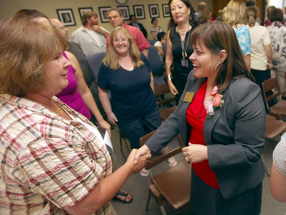 Not these days: Socorro Shiels, the Sonoma Valley Unified School District Superintendent, greets Wanda Calvert at a 2012 event in Santa Rosa. Such hands-on meetings are not possible now, as Zoom has become the room for most gatherings.