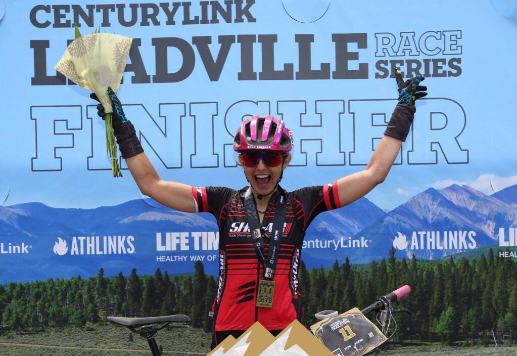Larissa Connors celebrates after finishing the Leadville 100 mountain bike race Saturday. (CenturyLink Leadville Trail 100 MTB photo)