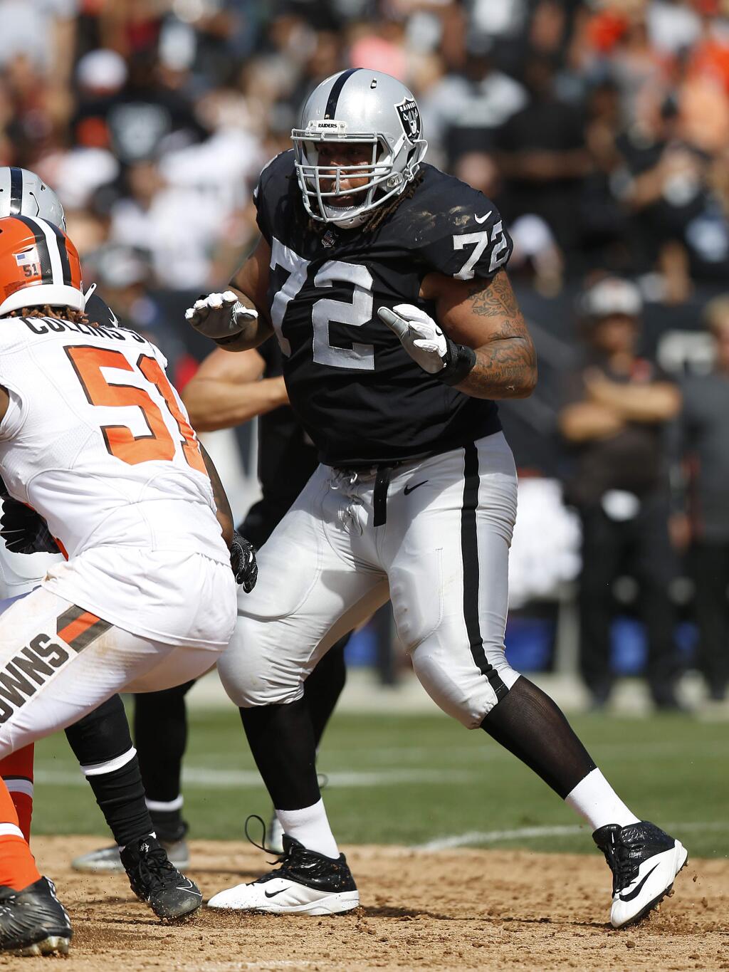 Oakland Raiders tackle Donald Penn against the Cleveland Browns during a game in Oakland, Sunday, Sept. 30, 2018. (AP Photo/D. Ross Cameron)