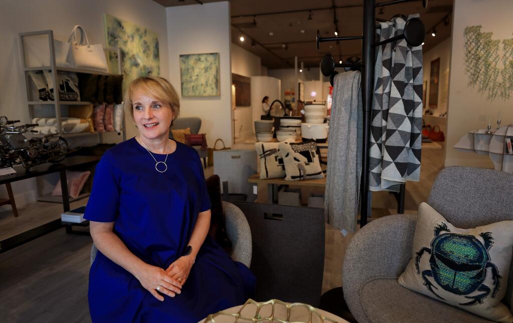 Jennifer Edwards and her recently opened business, The Passdoor, a high-end gallery store on the Sonoma Plaza, Thursday, April 25, 2019. Originally she opened the business at The Barlow but moved the business shortly before flooding damaged several business at the Sebastopol retail hub. (Kent Porter / Press Democrat)