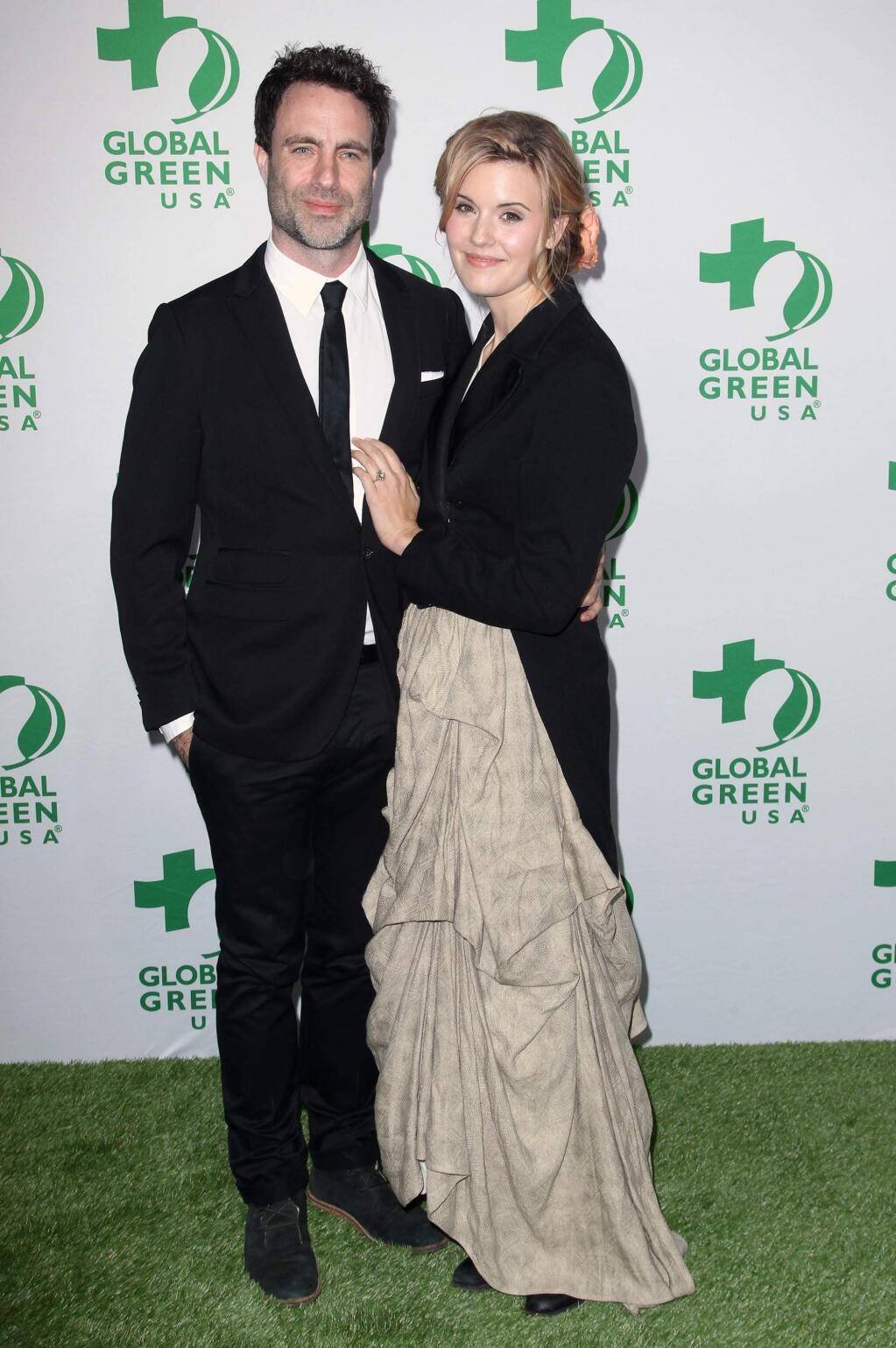 Matthew Cooke, left, and Maggie Grace arrive at the Global Green USA's 12th Annual Pre-Oscar Party at the Avalon Hollywood on Wednesday, Feb. 18, 2015, in Los Angeles. (Photo by John Salangsang/Invision/AP)