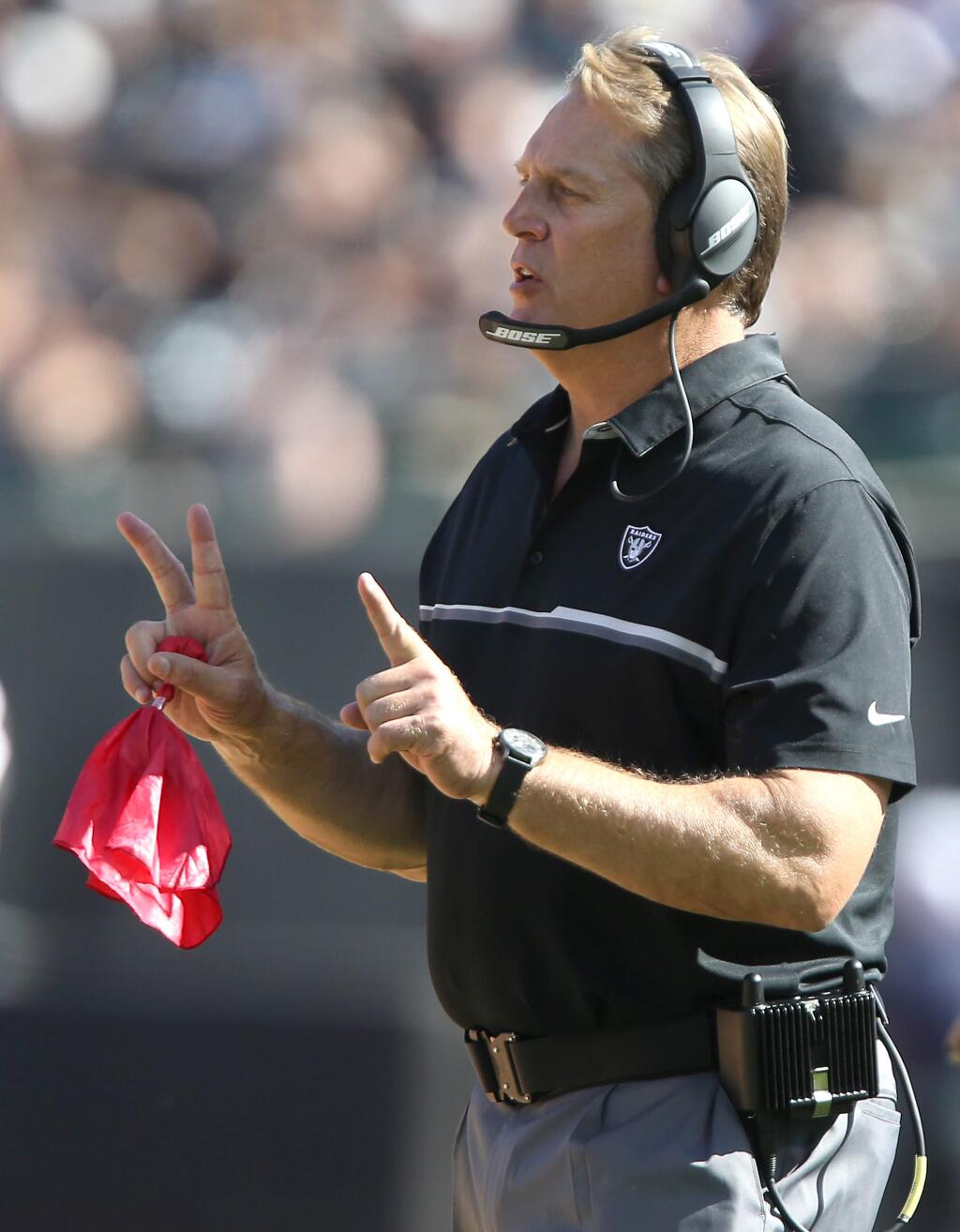 Oakland Raiders head coach Jack Del Rio challenges a call during their game against the Atlanta Falcons in Oakland on Sunday, September 18, 2016. The Raiders lost to the Falcons 35-28.(Christopher Chung/ The Press Democrat)