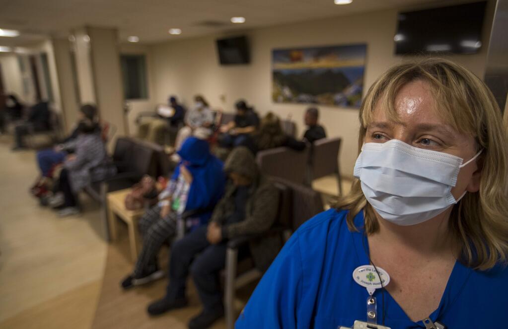 Stephanie Scott, RN, charge nurse, keeps an eye on patients in the emergency department at St. Joseph's Hospital in Orange, Calif., on Friday, Jan. 5, 2018. (Allen J. Schaben/Los Angeles Times/TNS)