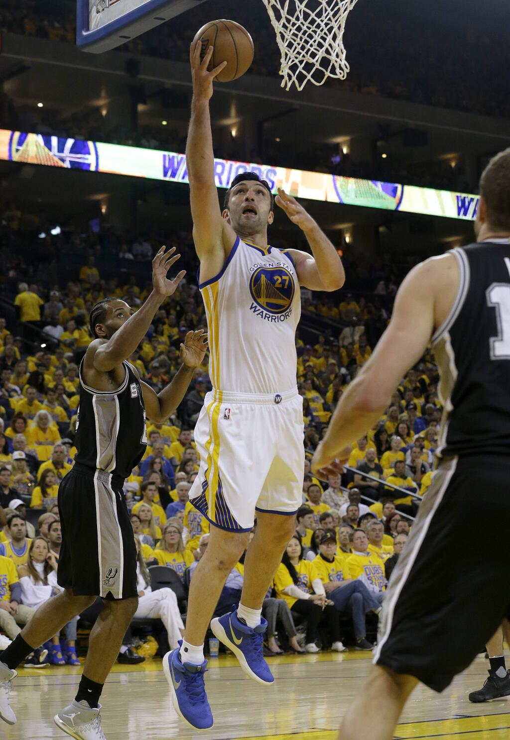 Golden State Warriors center Zaza Pachulia shoots against the San Antonio Spurs during Game 1 of the NBA Western Conference finals in Oakland, Sunday, May 14, 2017. (AP Photo/Jeff Chiu)
