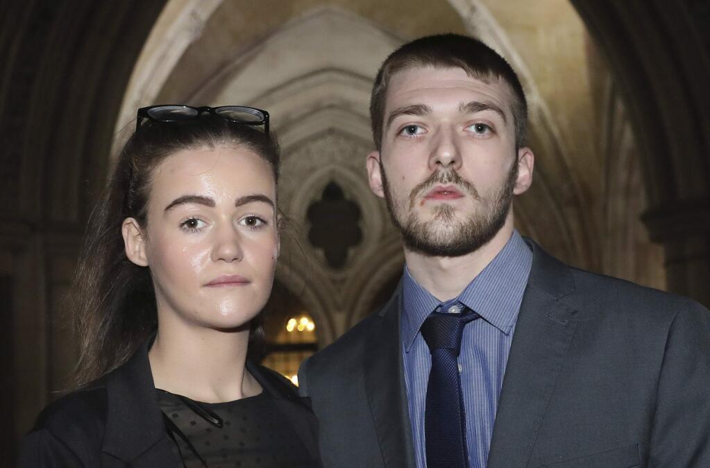 This Dec. 19, 2017 file photo shows Tom Evans and Kate James, the parents of seriously ill Alfie Evans, in England. (Philip Toscano/PA via AP,file)