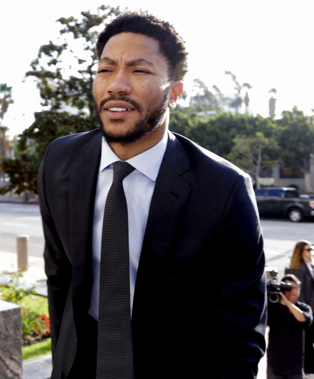 Derrick Rose arrives at Federal Court in Los Angeles, Tuesday, Oct. 18, 2016. Testimony is scheduled to resume in the lawsuit against Rose and two friends by a woman who claims she was raped while incapacitated three years ago. (AP Photo/Nick Ut)