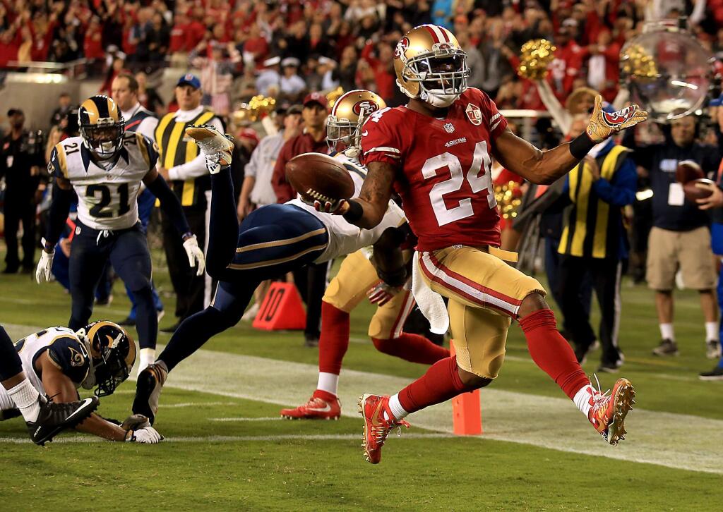 Shaun Draughn steps across the goal line for the Niners second TD of the night as they go up 14-0 at the half against the Rams, Monday, Sept. 12, 2016 at Levi's Stadium in Santa Clara.(Kent Porter / The Press Democrat) 2016