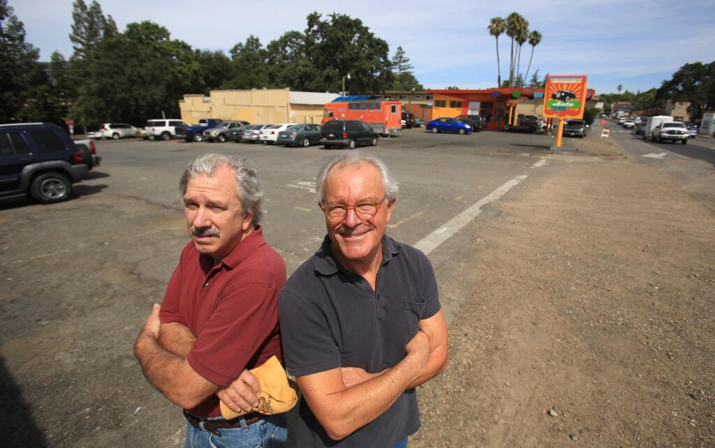 Rich Lee, chairman of the Springs Community Alliance, left and Sonoma architect Michael Ross are heading a push to build a plaza along Highway 12 in Boyes Hot Springs as a community gathering spot. (Kent Porter / Press Democrat)