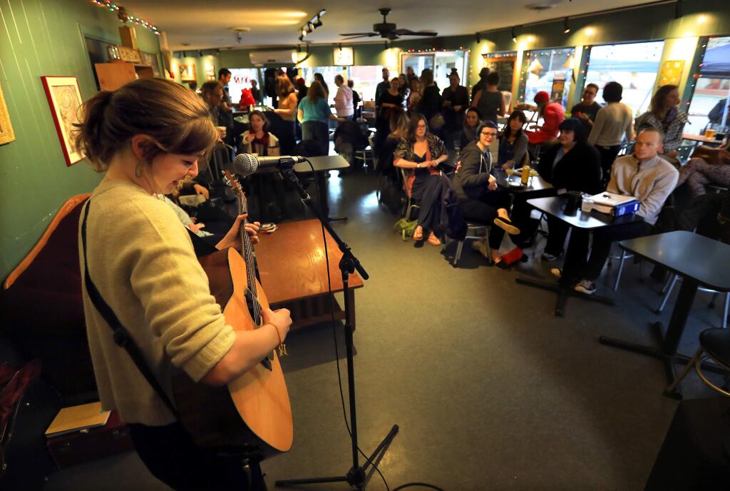 Hanna Haas plays for the crowd at a 44th birthday party celebrating the Roe V. Wade verdict at Brew in Santa Rosa on January 22, 2017. (John Burgess/The Press Democrat)