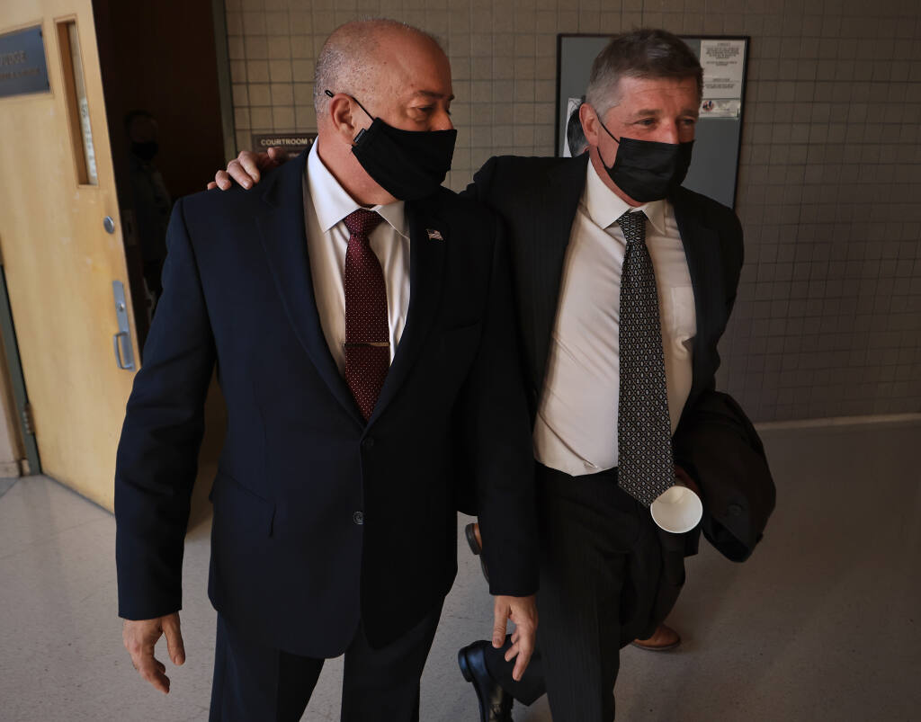 Former Sonoma County Sheriff’s Deputy Charles Blount, left, leaves Sonoma County Superior Court, Wednesday Feb. 2, 2022 with his attorney Harry Stern after Blount was found not guilty in the death of 52-year-old David Ward of Bloomfield.   (Kent Porter / The Press Democrat) 2022