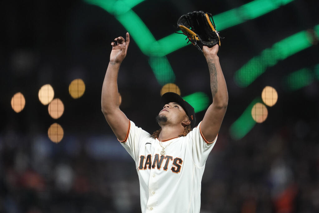 San Francisco Giants pitcher Camilo Doval celebrates after striking out the Arizona Diamondbacks’ Pavin Smith for the final out of the ninth inning in San Francisco on Wednesday, Sept. 29, 2021. (Jeff Chiu / ASSOCIATED PRESS)