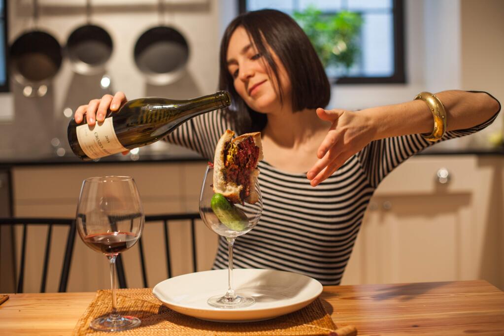 Writer and certified sommelier Bianca Bosker pairs a burger and pickles with its natural companion, a 2014 Crozes-Hermitage. Bosker will read from her 2017 best-seller 'Cork Dork' in Sonoma on March 16. (Submitted)