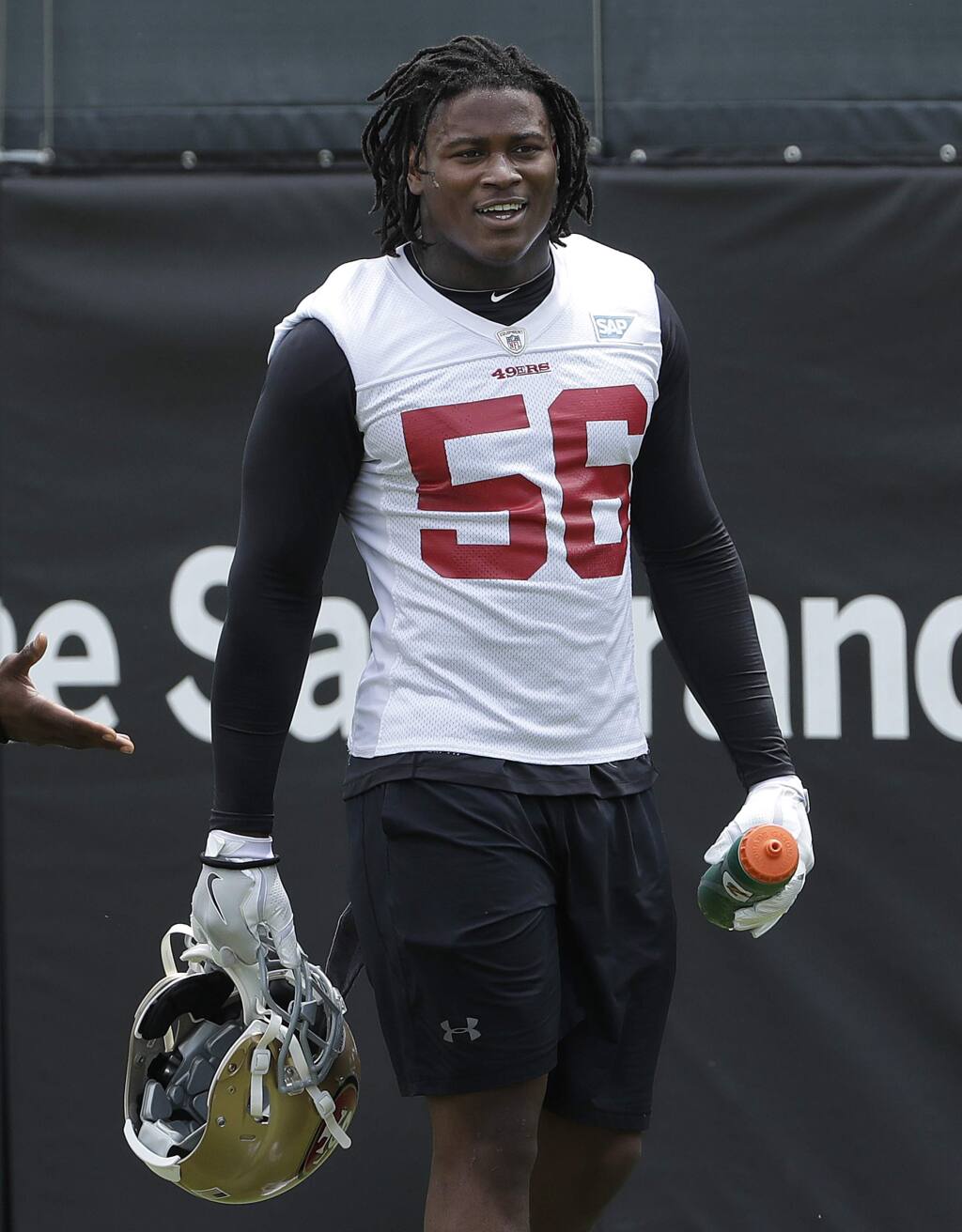 San Francisco 49ers linebacker Reuben Foster walks on the field during a practice at the team's training facility in Santa Clara, Wednesday, May 30, 2018. (AP Photo/Jeff Chiu)