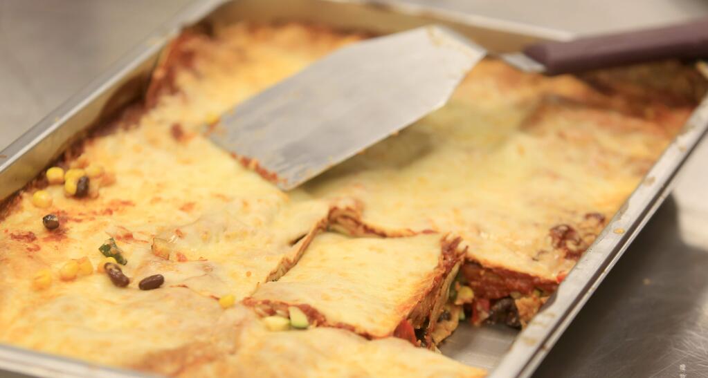 An enchilada casserole from donated items at the Redwood Empire Food Bank, Wednesday May 27, 2015 in Santa Rosa. (Kent Porter / Press Democrat) 2015