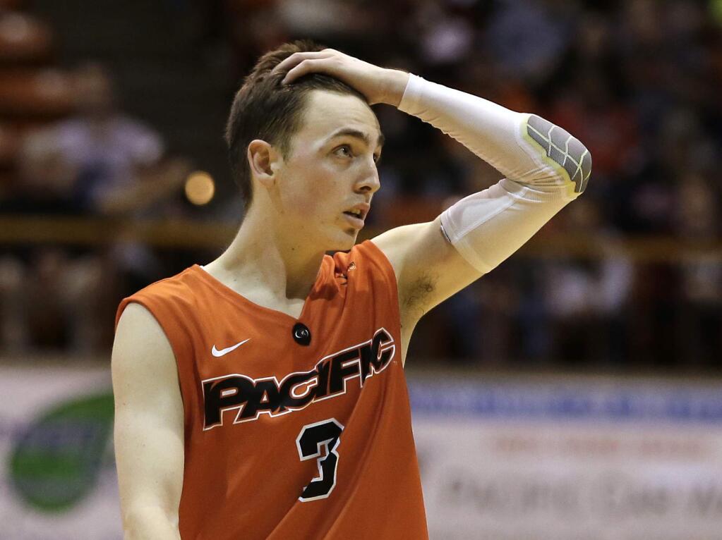 Pacific guard Alec Kobre looks toward the scoreboard during the closing moments of Pacific's 71-61 loss to Gonzaga in an NCAA college basketball game Saturday, Jan. 23, 2016, in Stockton, Calif. (AP Photo/Rich Pedroncelli)