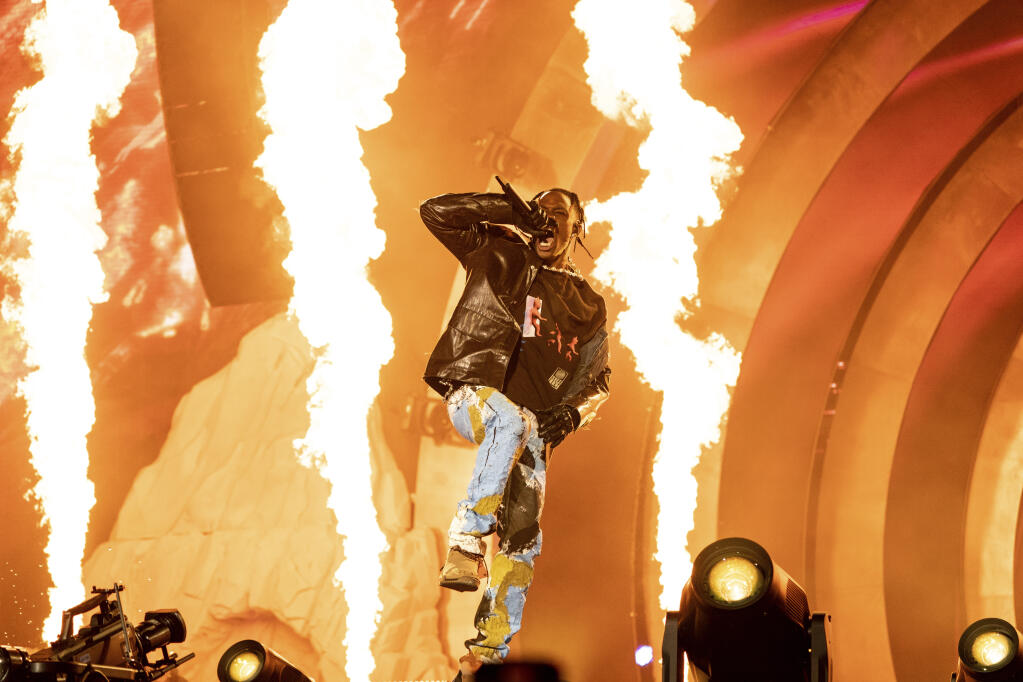 Travis Scott performs on day one of the Astroworld Music Festival at NRG Park on Friday, Nov. 5, 2021, in Houston. (Amy Harris/Invision/AP)
