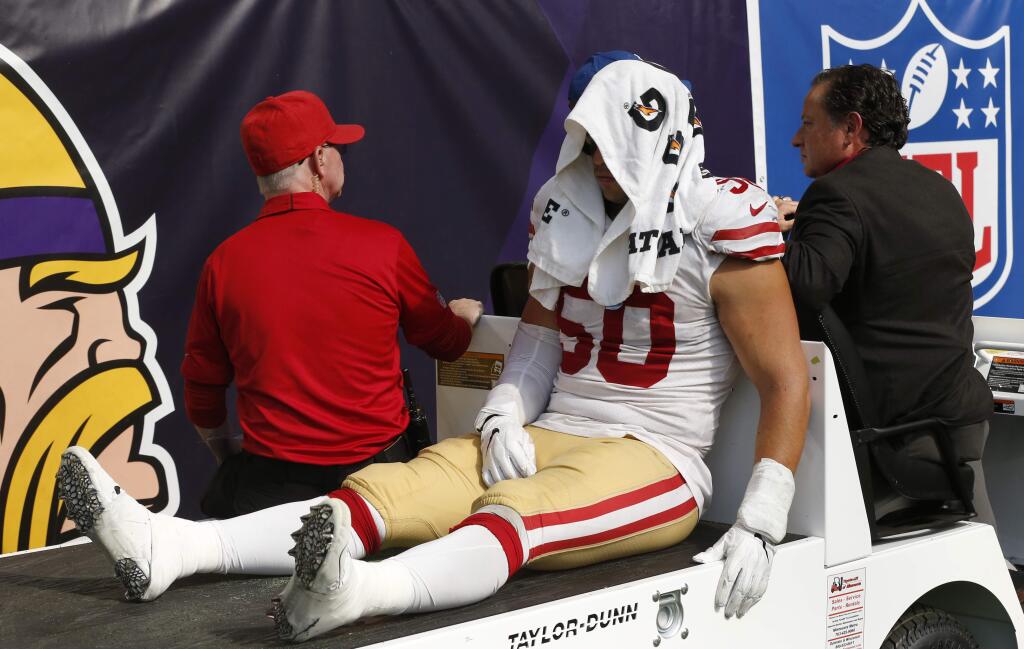 San Francisco 49ers linebacker Brock Coyle is carted off the field after getting injured during the second half of an NFL football game against the Minnesota Vikings, Sunday, Sept. 9, 2018, in Minneapolis. The Vikings won 24-16. (AP Photo/Jim Mone)