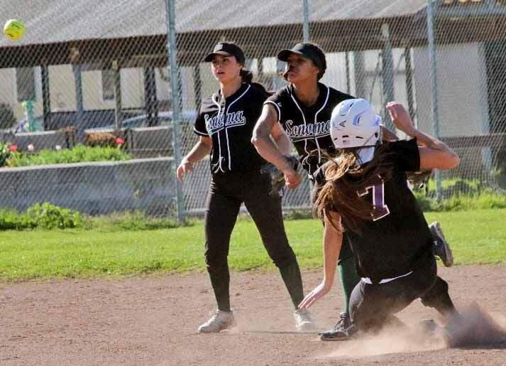 DWIGHT SUGIOKA/FOR THE ARGUS-COURIERPetaluma's Jaden Krist slidesin hard.. Krist had a good day for the T-Girls, but it wasn't enough to prevent a nine-inning loss to Sonoma Valley.
