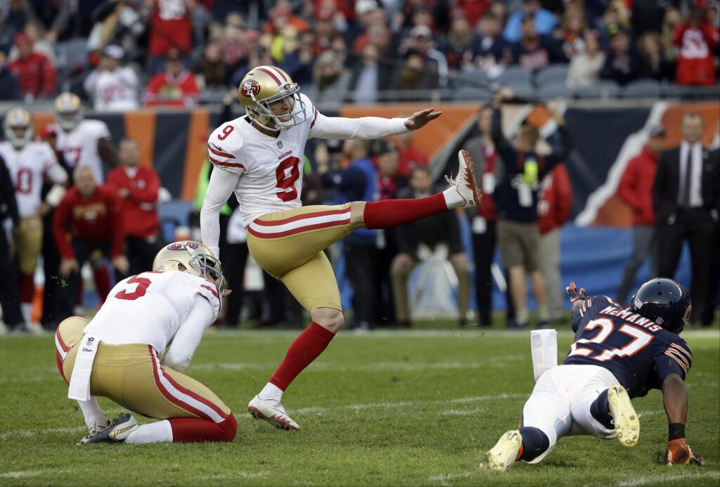 San Francisco 49ers kicker Robbie Gould (9) kicks a game winning field goal during the second half of an NFL football game against the Chicago Bears, Sunday, Dec. 3, 2017, in Chicago. The 49ers won 15-14. (AP Photo/Nam Y. Huh)