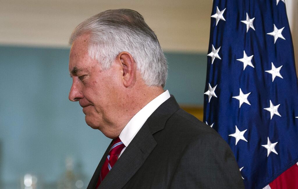 FILE - In this Nov. 30, 2017 file photo, Secretary of State Rex Tillerson is shown during a meeting with German Foreign Minister Sigmar Gabriel, at the State Department in Washington. Trump ousted Rex Tillerson as secretary of state Tuesday, making a surprise Twitter announcement that he's naming CIA director Mike Pompeo to replace him. (AP Photo/Cliff Owen)