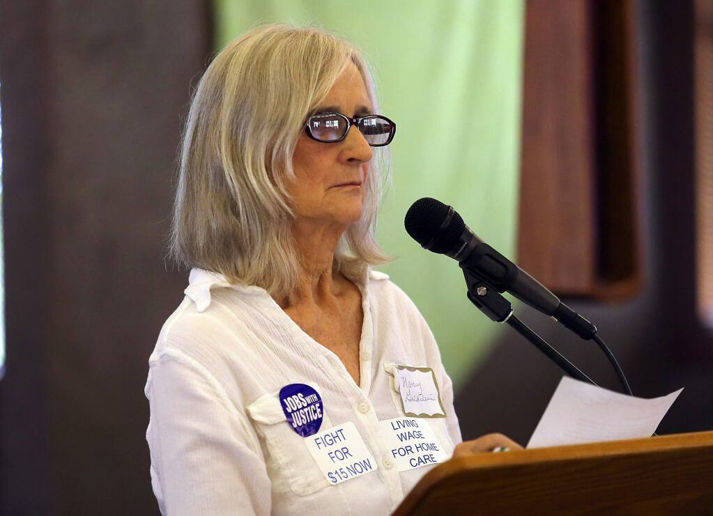 In-home supportive service provider Nancy Goldstein talks about caring for her grown son after an accident left him disabled during a Workers' Rights Board Hearing in Santa Rosa on Saturday.. (JOHN BURGESS / The Press Democrat)
