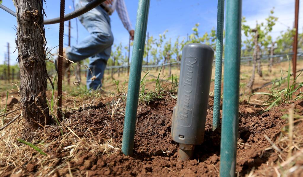 An Aqua Check probe is buried deep in the ground to monitor moisture in the soil at Benziger Family Vineyards in Glen Ellen, Friday April 24, 2015. (Kent Porter / Press Democrat) 2015