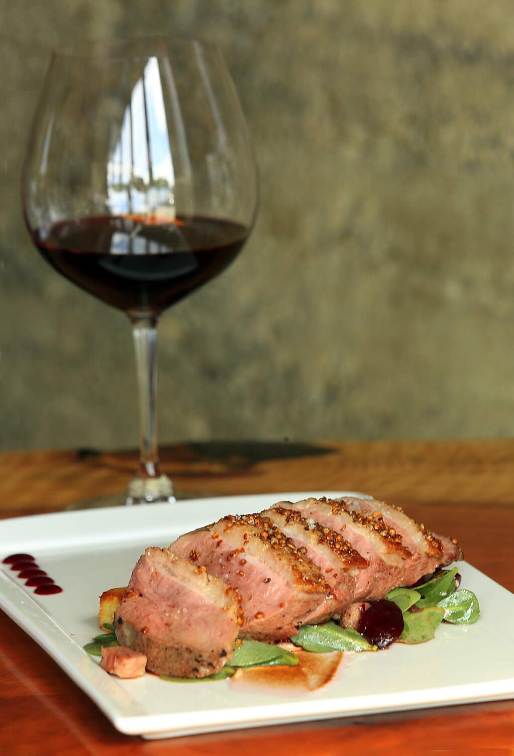 Coriander Crusted Duck Breast on cured duck leg and almond cake with cherry jus by chef Dustin Valette at Valette Healdsburg. (JOHN BURGESS / The Press Democrat)