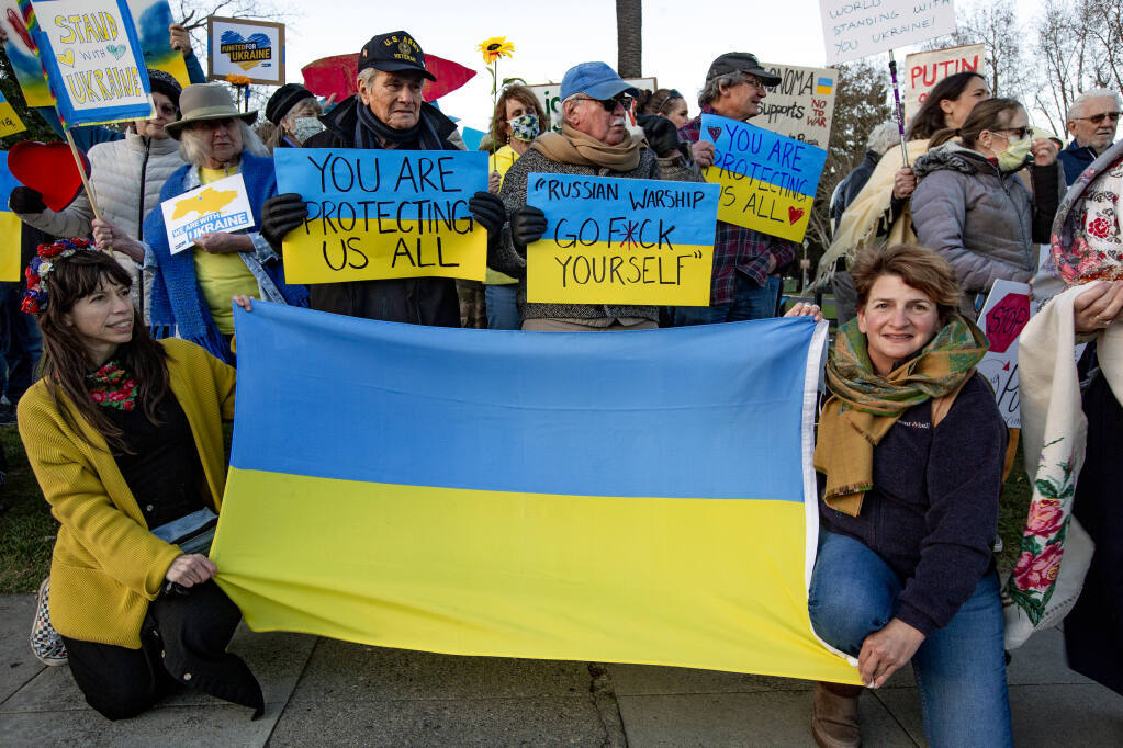 Around 100 people gathered on Sonoma Plaza on Friday, March 4, 2022, to express their support of Ukraine. (Robbi Pengelly/Index-Tribune)