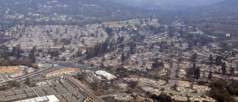Wikiup and Larkfield, and Berry Hill Estates (bottom right), Oct. 11, three days after the Tubbs fire. (Kent Porter/The Press Democrat)