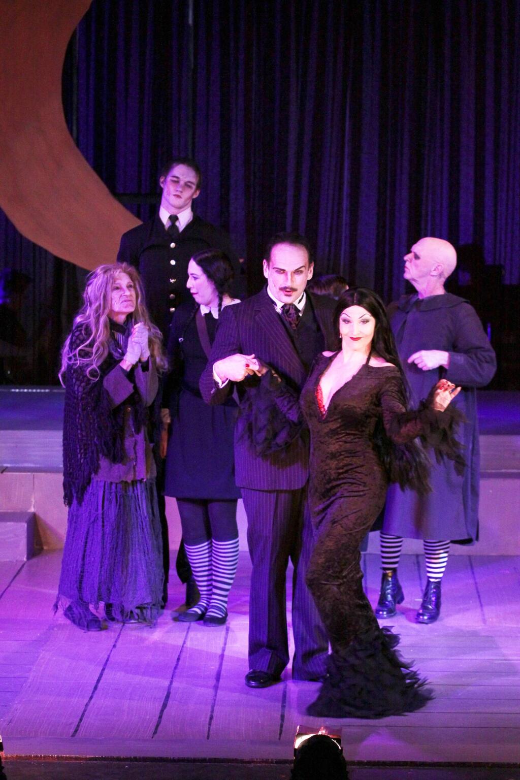 'The Addams Family,' a new musical by 6th Street Playhouse at the G.K. Hardt Theatre. From left: Mollie Boice as Grandma, William Keyes Schlosser as Lurch, Shawna Olivia Eiermann as Wednesday Adams, Michael RJ Campbell as Gomez Addams, Shannon Rider as Morticia Addams and Kit Grimm as Uncle Fester. (photo: ERIC CHAZANKIN)