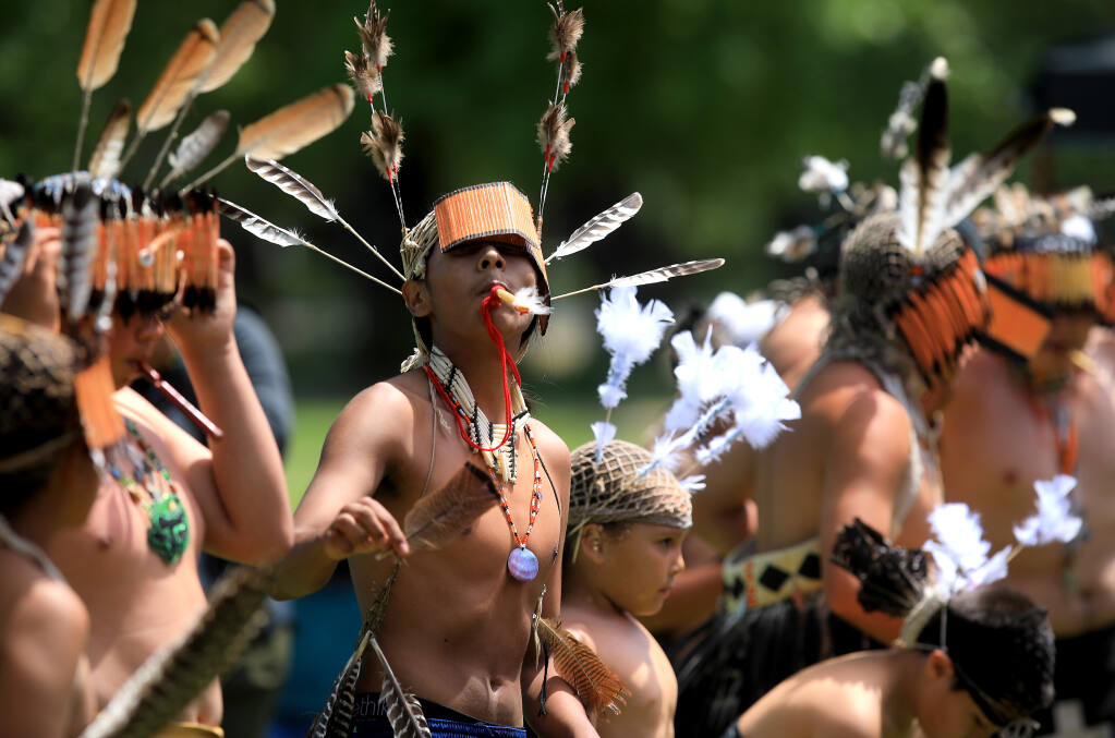 The Santa Rosa Youth Pomo Dancers perform at a rally on the front lawn of Santa Rosa Junior College, Saturday, May 15, 2021.  (Kent Porter / The Press Democrat) 2021