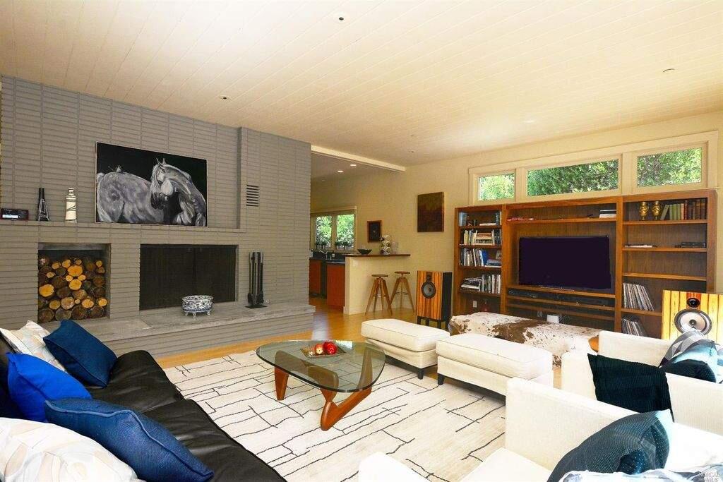 A modern living room fireplace with wood storage at 236 E. Spain St., Sonoma. Property listed by Carolina Salmonsen, Pacific Union International, 707-939-9500. (Courtesy of BAREIS MLS)