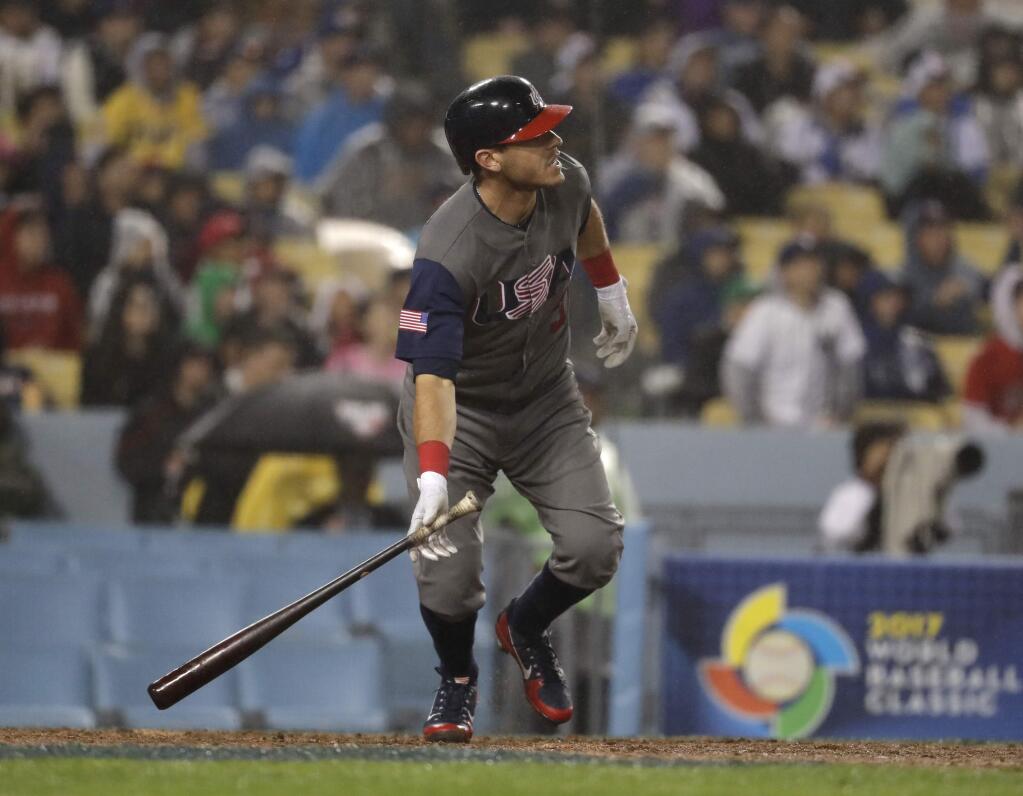 United States' Ian Kinsler hits a double during the eighth inning of a semifinal in the World Baseball Classic against Japan, in Los Angeles, Tuesday, March 21, 2017. (AP Photo/Chris Carlson)