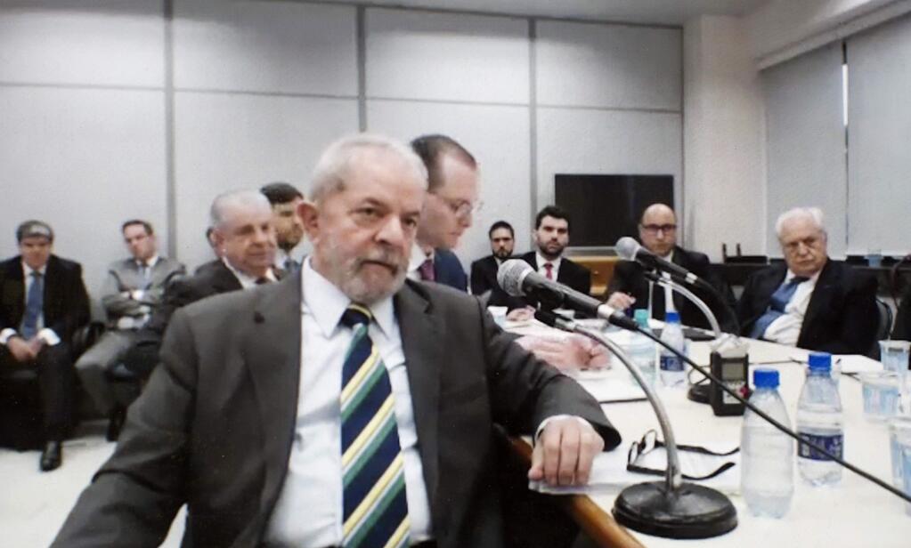 This screen grab of a video recorded on May 10, 2017, released by the Parana Federal Justice department, shows Brazil's former President Luiz Inacio Lula da Silva testifying in the Car Wash investigation in Curitiba, Brazil. A federal judge convicted the ex-president of corruption and money laundering on Wednesday, July 12, 2017 and sentenced him to nine and a half years in jail. Silva will remain free while an appeal is heard. (Parana Federal Justice department via AP)