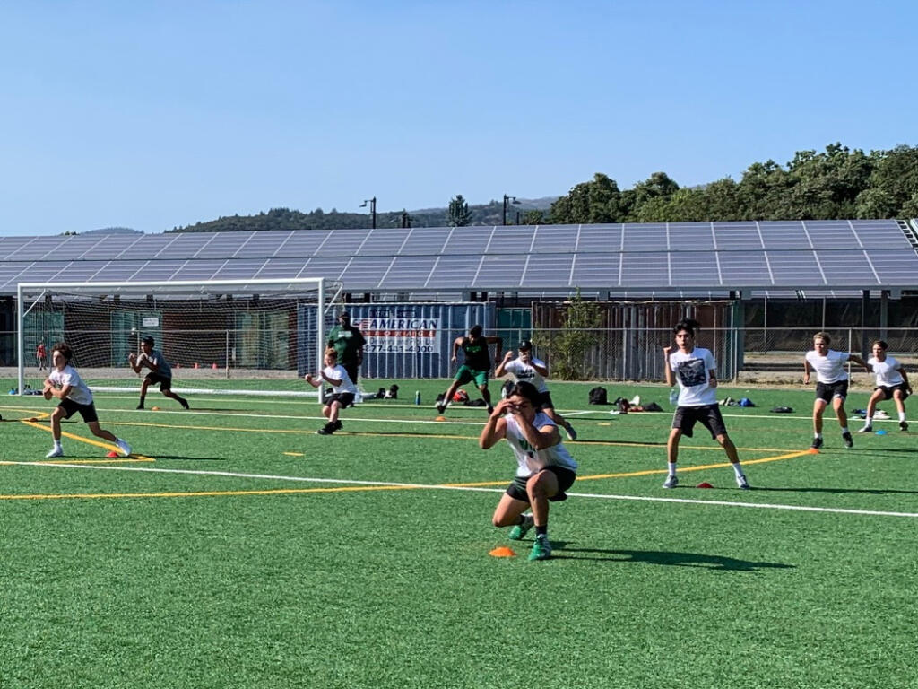 Sonoma Valley High School football hopefuls work out at SVHS on Wednesday, July 15, 2020. They practice not only the sport but social distancing during these summer conditioning sessions.