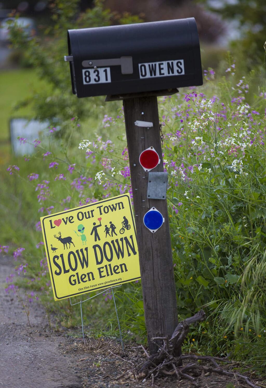 'Slow' signs on Madrone Road. (Photo by Robbi Pengelly/Index-Tribune)