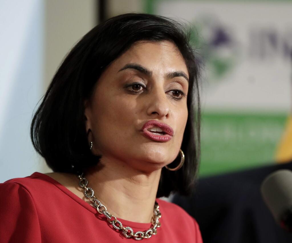 FILE - In this Nov. 29, 2017 file photo, Seema Verma, administrator of the Centers for Medicare and Medicaid Services, speaks during a news conference in Newark, N.J. The Trump administration says it's offering a path for states that want to seek work requirements for Medicaid recipients, and that's a major policy shift toward low-income people. (AP Photo/Julio Cortez)