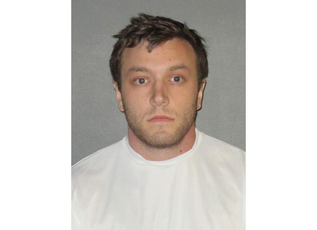 Kenneth Gleason is shown in an undated booking photo provided by the East Baton Rouge Sheriff's Office. Police believe the slayings of two black men in Baton Rouge were likely racially motivated and said Sunday, Sept. 17, 2017, that they have a person of interest - Gleason- in custody. Gleason, was being held on drug charges. Authorities do not yet have enough evidence to charge him with murder, Baton Rouge Sgt. L'Jean McKneely told The Associated Press. (East Baton Rouge Sheriff's Office via AP)