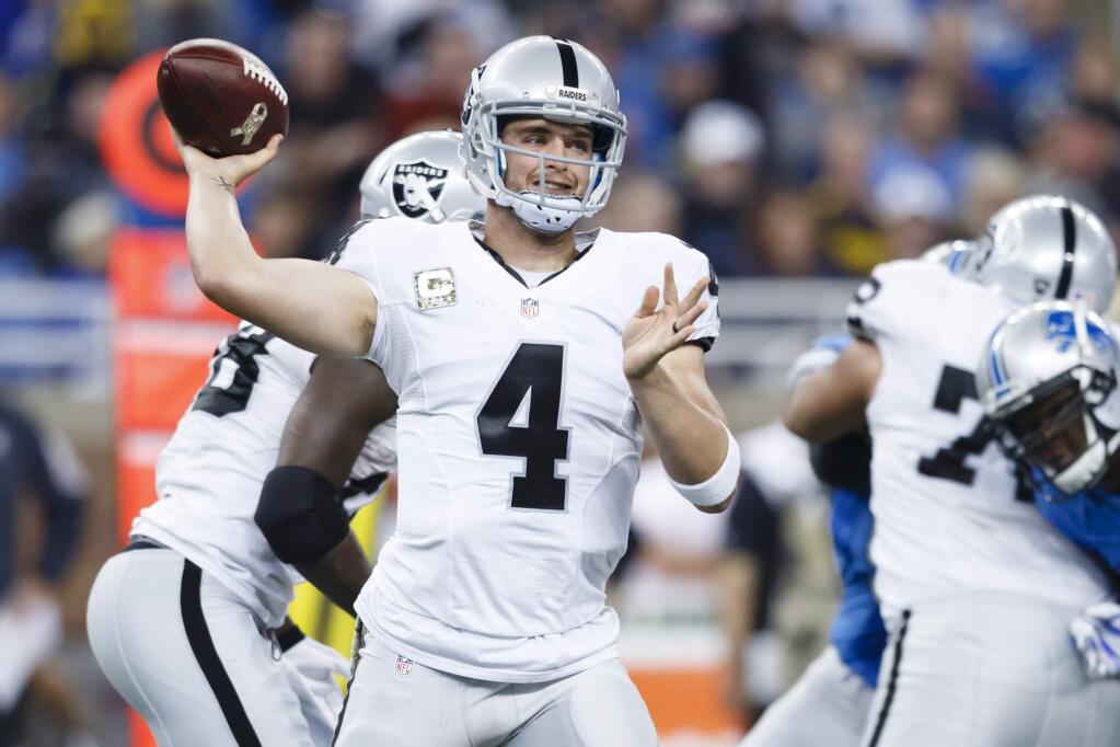 In this Sunday, Nov. 22, 2015 file photo, Oakland Raiders quarterback Derek Carr (4) passes against the Detroit Lions. The Oakland Raiders are showing how important a young quarterback can be to a team with Derek Carr taking charge in his second season. (AP Photo/Rick Osentoski, File)