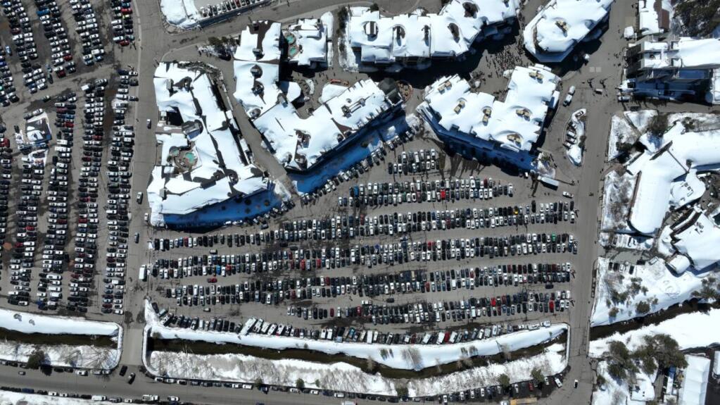 This photo shows an aerial view of the parking lot at Palisades Tahoe in Olymic Valley. The resort announced Friday, June 2, 2023, that it is planning a new reserve-in-advance parking program to alleviate traffic impacts caused by visitors. (Palisades Tahoe)
