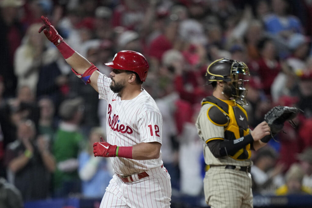 The Phillies' Kyle Schwarber celebrates his home run during the first inning in Game 3 of the NL Championship Series against the San Diego Padres on Friday, Oct. 21, 2022, in Philadelphia. (Matt Slocum / ASSOCIATED PRESS)