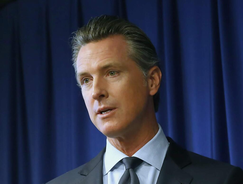 FILE - In this Wednesday, Sept. 18, 2019, file photo, Gov. Gavin Newsom speaks at a news conference in Sacramento, Calif. Newsom has signed a law giving child sexual assault victims more time to file lawsuits. (AP Photo/Rich Pedroncelli, File)