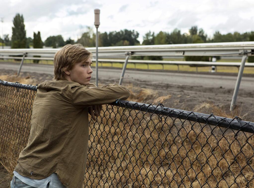 This image released by A24 films shows Charlie Plummer in a scene from the film, 'Lean on Pete.' (Scott Patrick Green/A24 via AP)